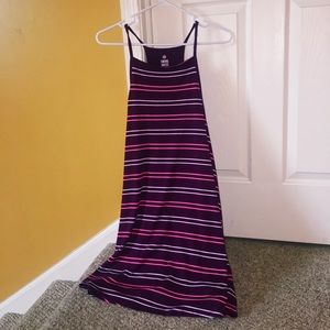 A burgundy dress with pink and white stripes.